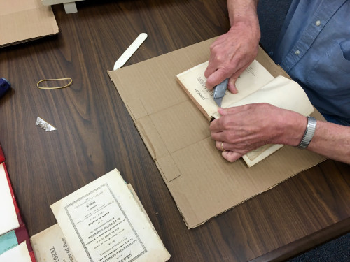 Unbinding ephemera at MSLR/FST Library and Archive.